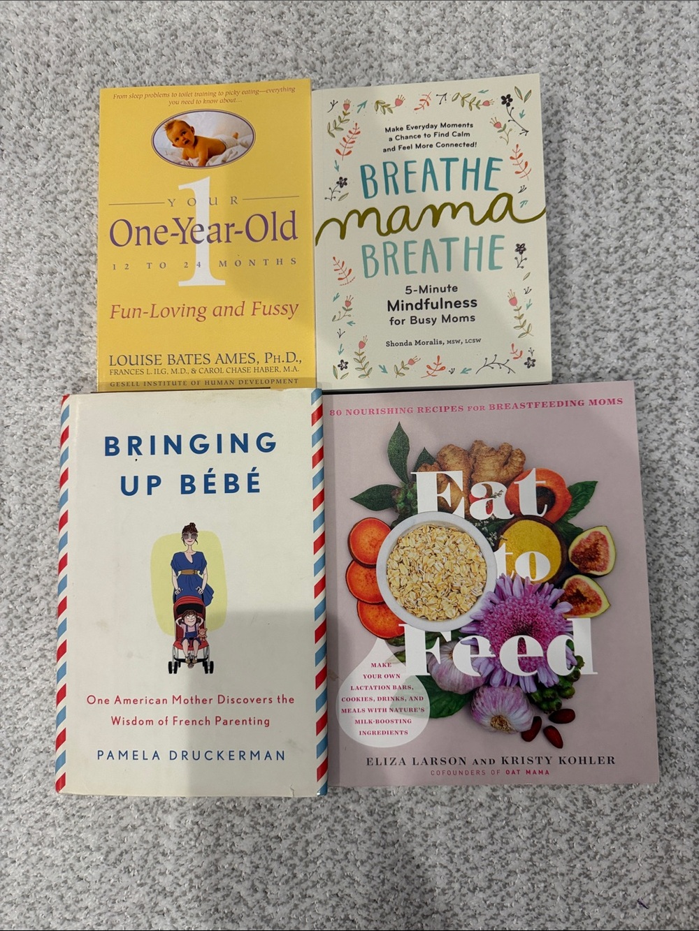 Set of 4 Parenting & Baby Books - Yellow, Cream, White, Pink Covers